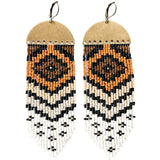 The 'Abiquiu' earrings by Certain Notions Handmade Designs. Made with Miyuki Delica glass seed beads in neutral brown colors woven onto a half-circle raw brass charm. Photographed on a white background.